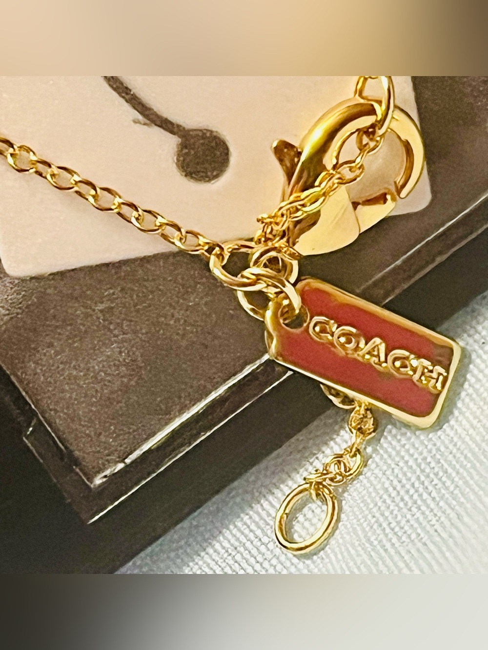 Coach Gold-Tone Crystal Circle 'C' Necklace - Picture 5 of 5